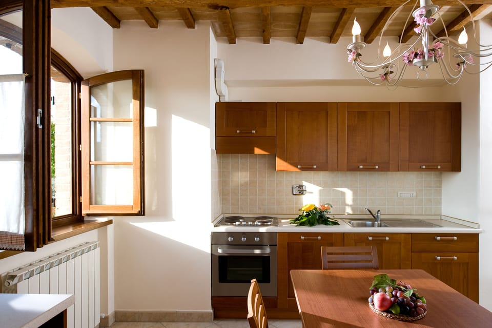Family Apartment, Patio, Ground Floor | Private kitchen | Full-size fridge, microwave, oven, stovetop
