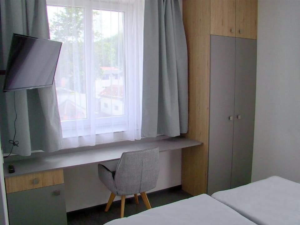 Comfort Studio Suite, 1 Bedroom | Desk, laptop workspace, blackout drapes, iron/ironing board