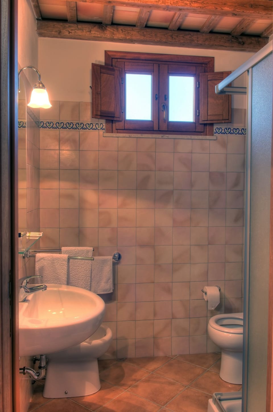 Shower, rainfall showerhead, designer toiletries, hair dryer