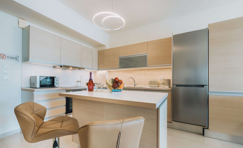 Apartment, 2 Bedrooms | Private kitchen | Full-size fridge, microwave, oven, stovetop
