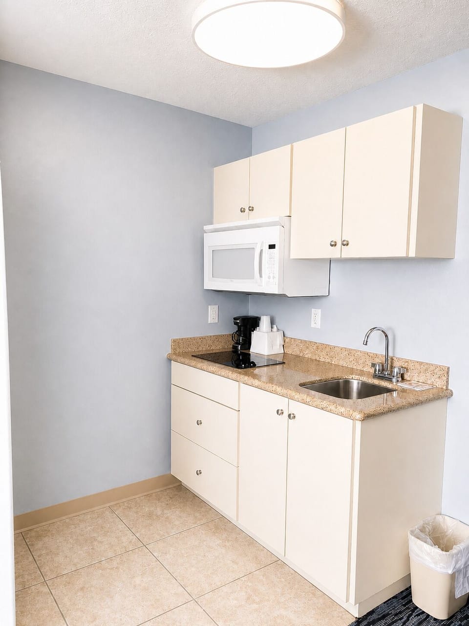 Studio Handicap Single Queen Bed | Private kitchen | Full-size fridge, microwave, stovetop, coffee/tea maker