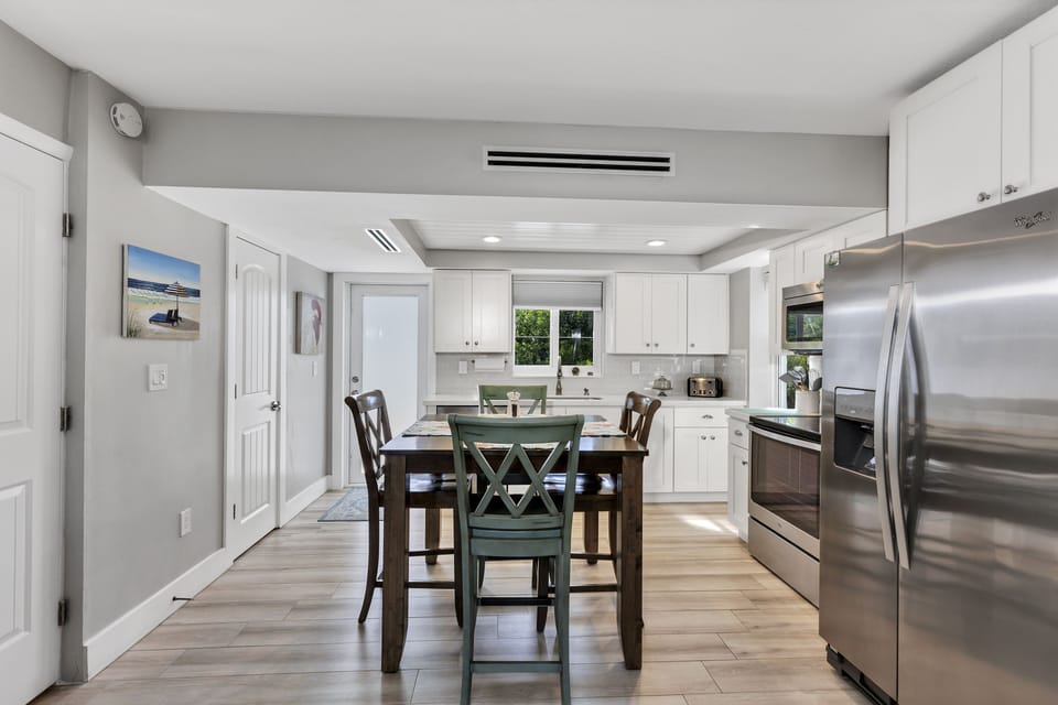 Open concept dining and main lounge area on 2nd floor.