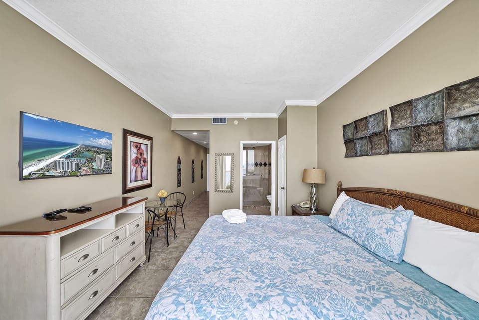 Lock-off bedroom has its own private patio access, full bathroom w/ TV & closet