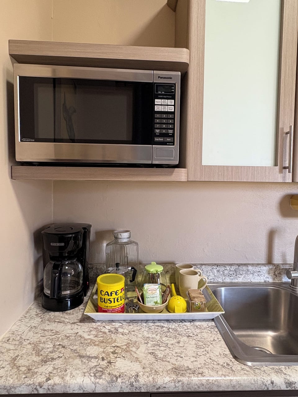 Microwave and coffee bar. Cafe Bustello coffee, sugar filtered water and tea
