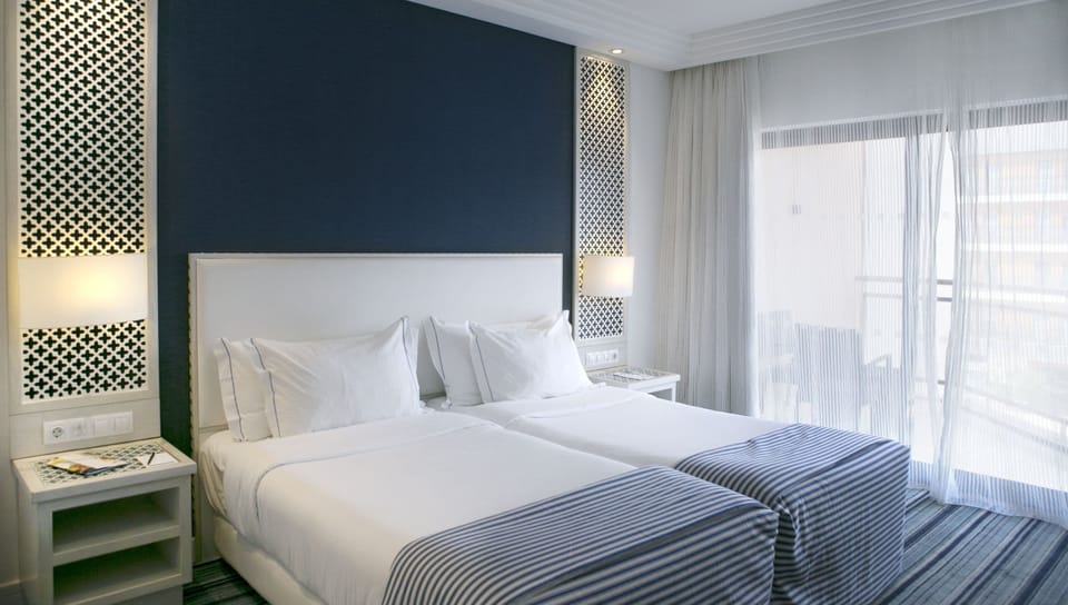 Premium bedding, minibar, in-room safe, desk