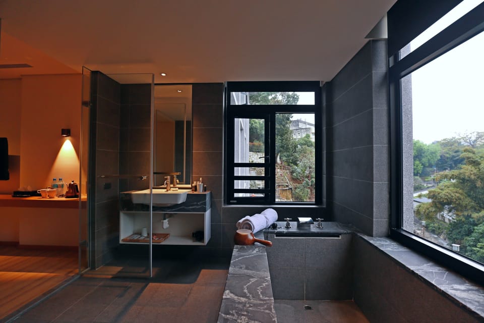 Deluxe Double Room, Park View | Bathroom | Separate tub and shower, spring water tub, rainfall showerhead