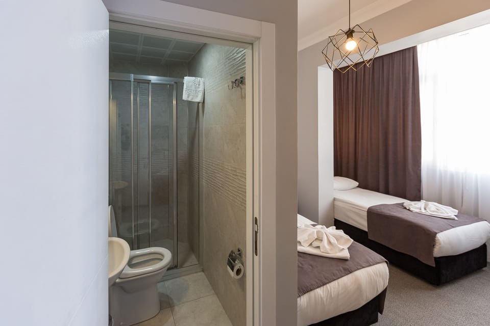 Superior Triple Room | 1 bedroom, desk, laptop workspace, blackout drapes