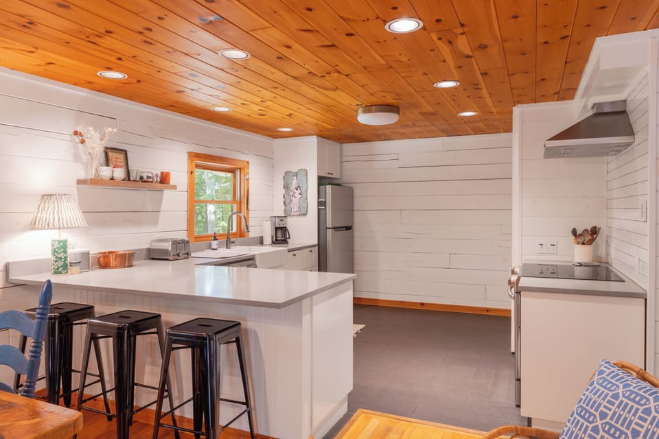 Bright kitchen with full amenities for cooking and entertaining.