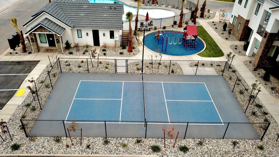 On-site pickleball and sport courts for guests to enjoy during their stay. Children's playground, fun for the whole family