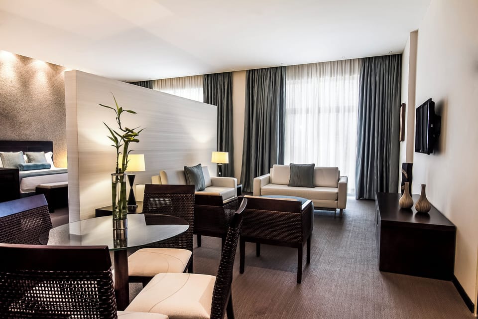 Classic Suite, City View | Living room | 42-inch plasma TV with cable channels, TV