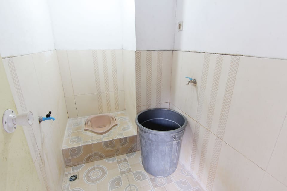 Standard Room | Bathroom | Shower, towels
