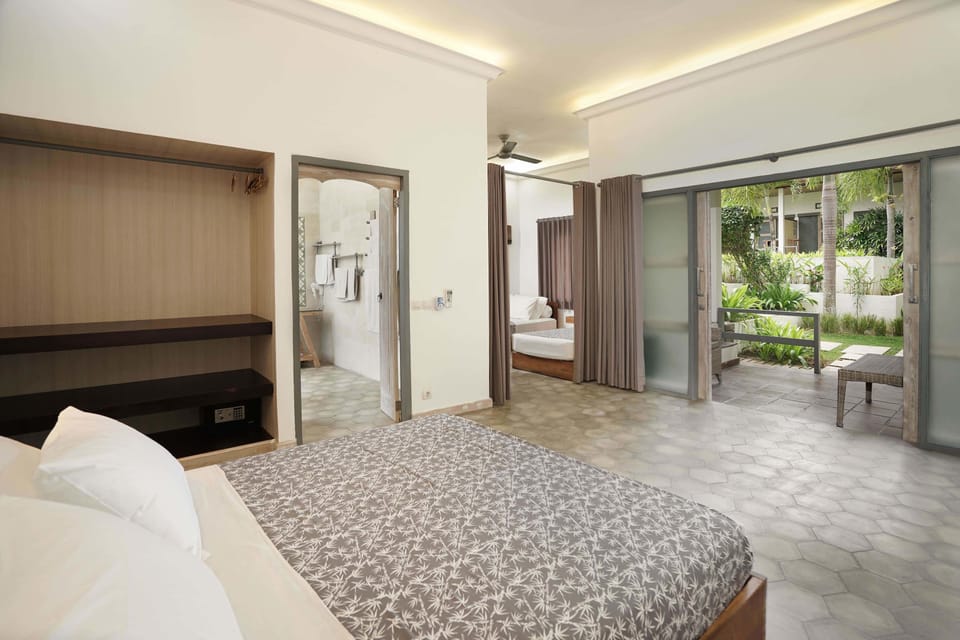 Quadruple Room, Multiple Beds, Garden View | In-room safe, desk, laptop workspace, blackout drapes