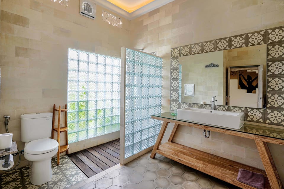 Quadruple Room, Multiple Beds, Garden View | Bathroom | Shower, free toiletries, hair dryer, towels