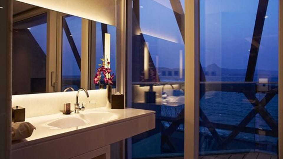 Ocean View Loft Suite, No Smoking | Bathroom | Separate tub and shower, free toiletries, hair dryer, slippers