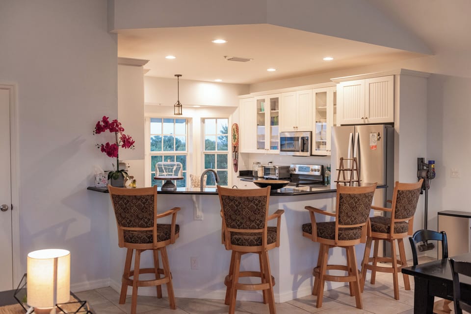 Large Bar with Seating Attached to Chef's Kitchen