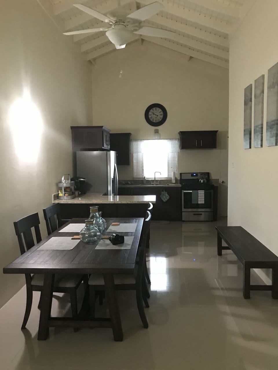 Open concept kitchen, dining and living room