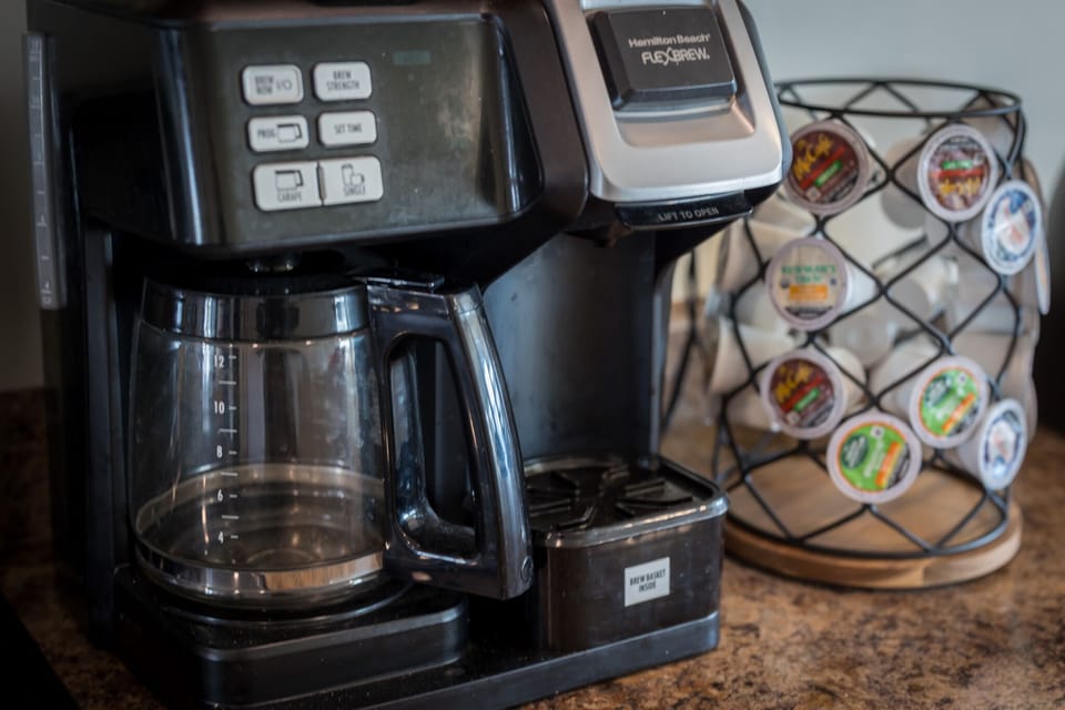 K - Cup coffee maker with variety of K cups provided