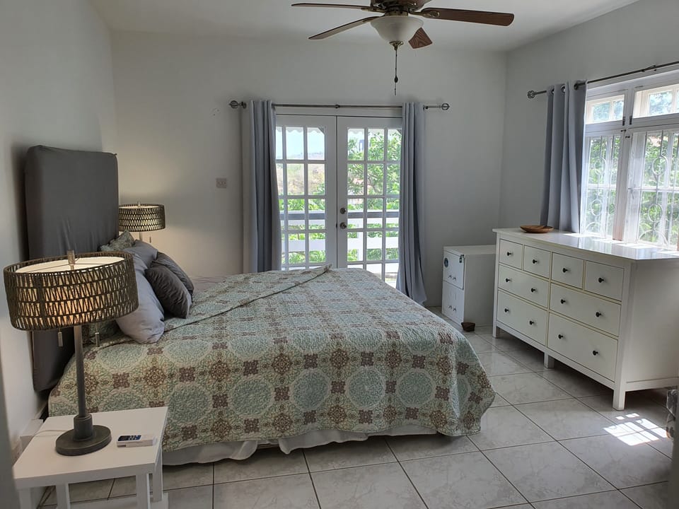 Master bedroom with view and windows + AC