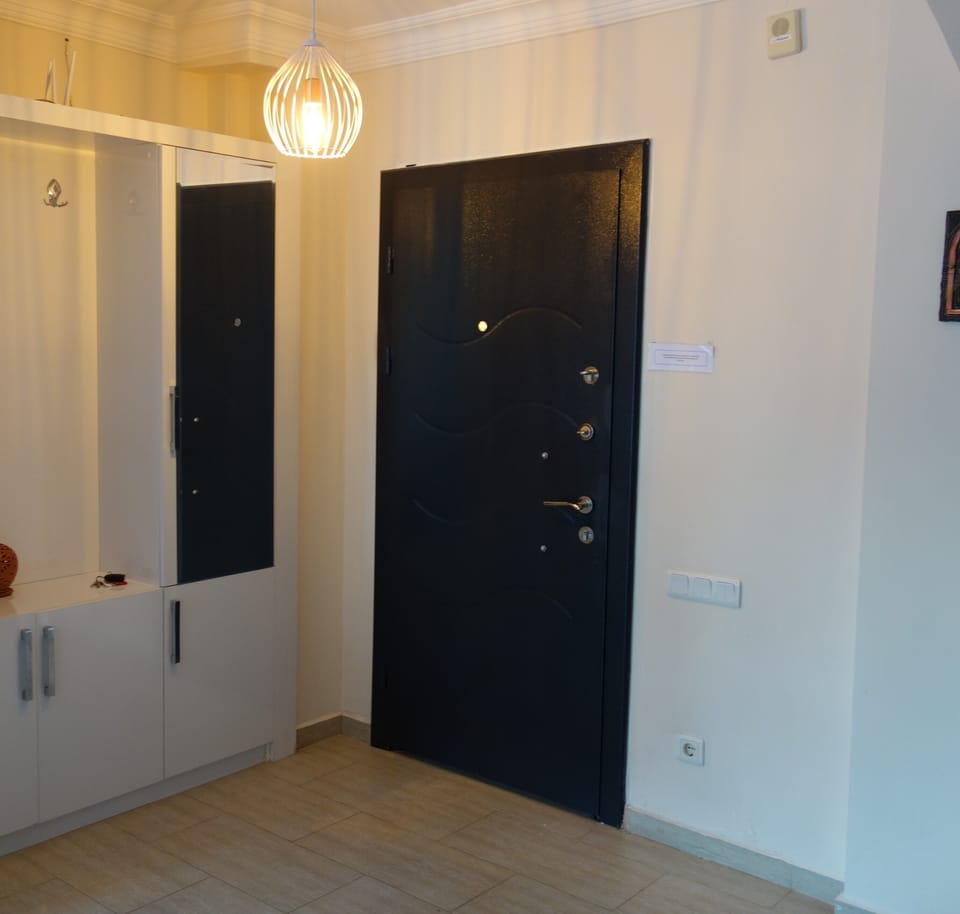 Entrance hall way into open plan living area