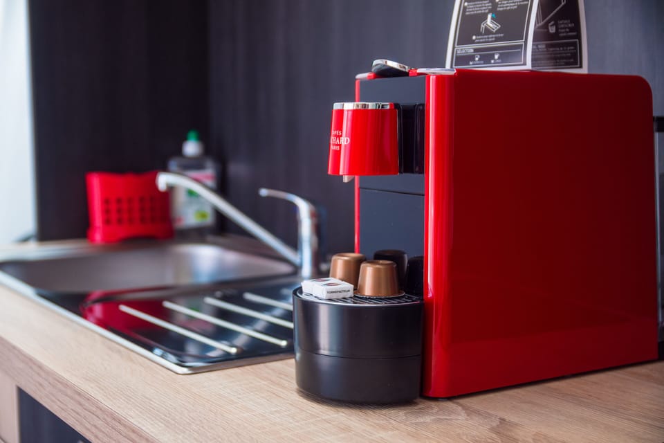 Exclusive Studio, Pool View | Private kitchen | Fridge, microwave, stovetop, dishwasher