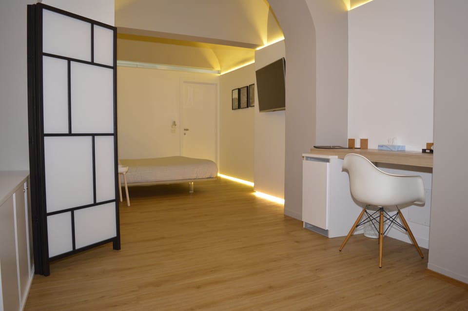 Family Quadruple Room | Down comforters, memory foam beds, minibar, in-room safe