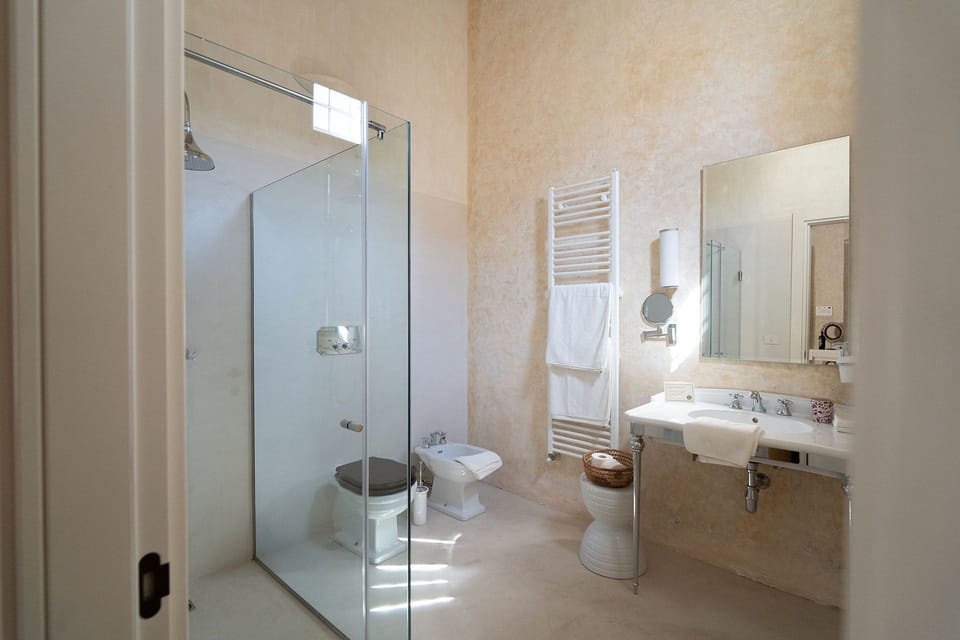 Superior Suite | Bathroom | Designer toiletries, slippers, bidet, towels