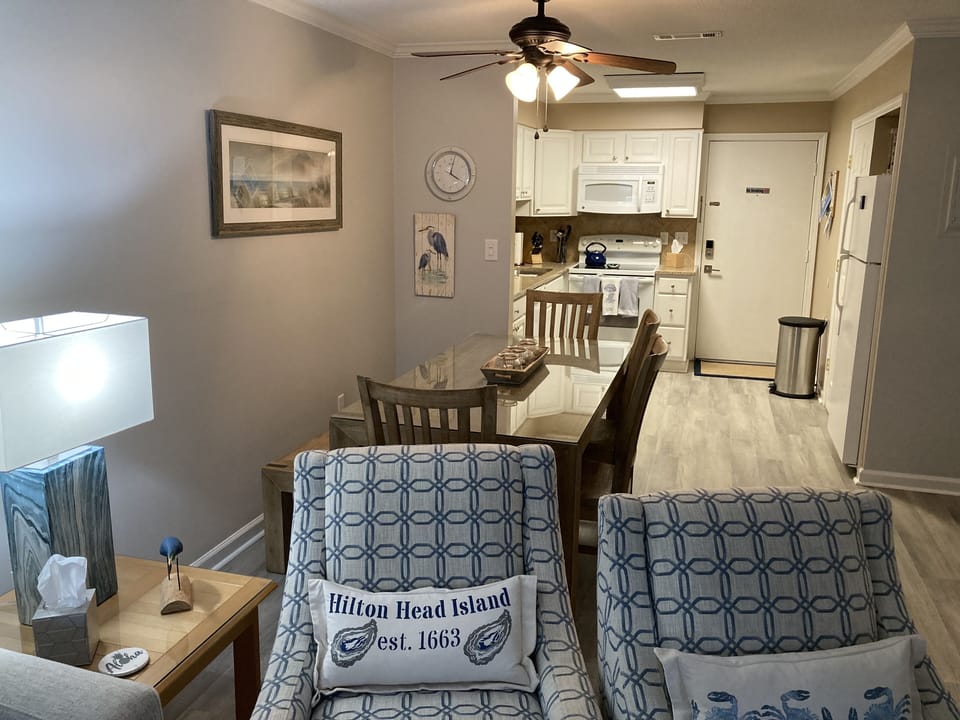 Dining Area with table, bench and four chairs