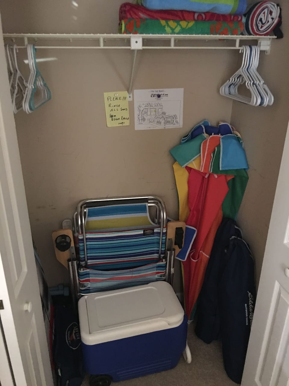 Guest bedroom closet with beach gear
