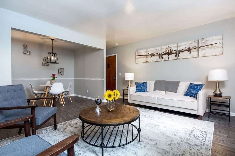 The main living area paying homage to the airport our building sits walking distance from. The couch is a full sized fold down bed that we think is extremely comfy! And great for fitting a few more fellow travelers!