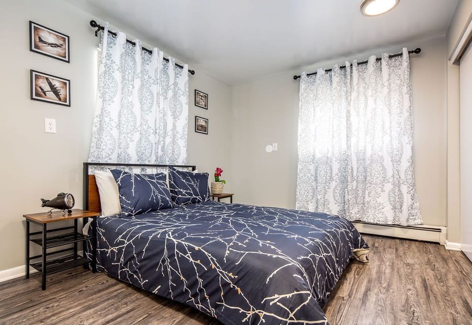 Master bedroom with queen platform bed (it is lower)
Private half bath 