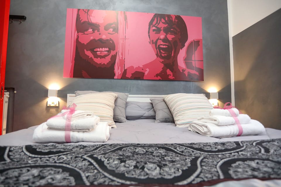 Classic Quadruple Room, 1 Bedroom, Non Smoking, City View | Premium bedding, individually furnished, desk, laptop workspace