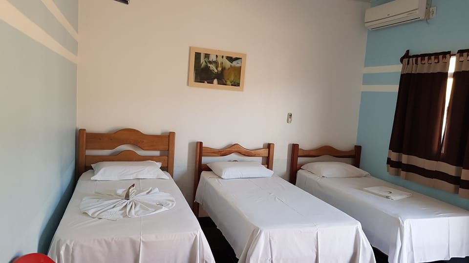 Triple Room | Minibar, desk, blackout drapes, iron/ironing board (on request)