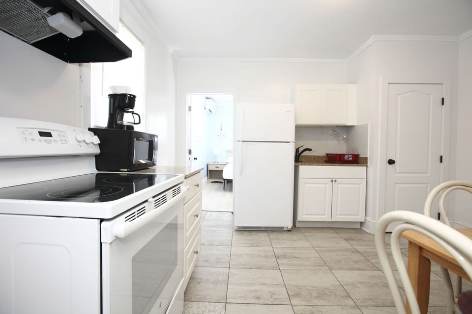 Apartment, 2 Bedrooms, Non Smoking (Town Side) | Private kitchen | Full-size fridge, microwave, oven, stovetop