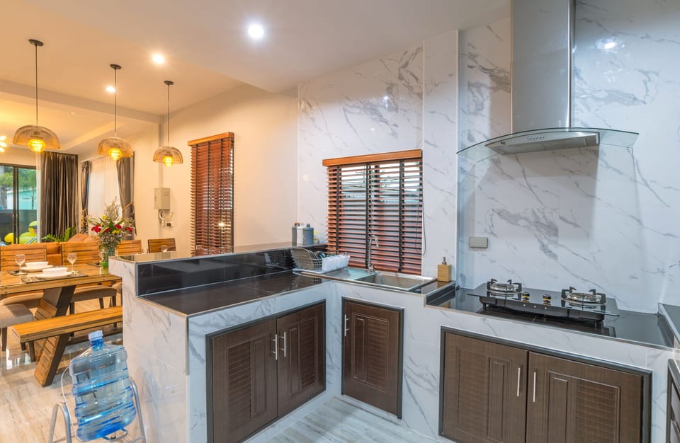 Family Villa | Private kitchen | Full-size fridge, microwave, stovetop, coffee/tea maker