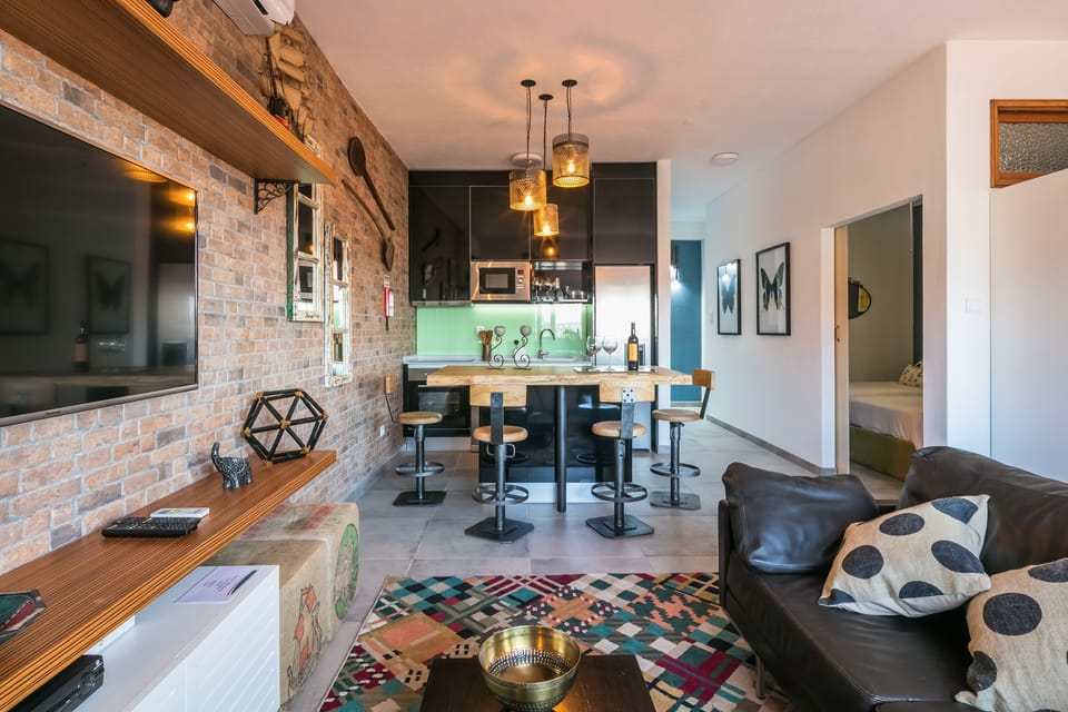 Family Apartment, 1 Bedroom, City View | Living room | 42-inch flat-screen TV with cable channels, TV
