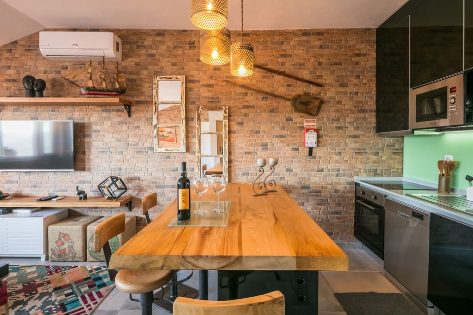 Family Apartment, 1 Bedroom, City View | In-room dining