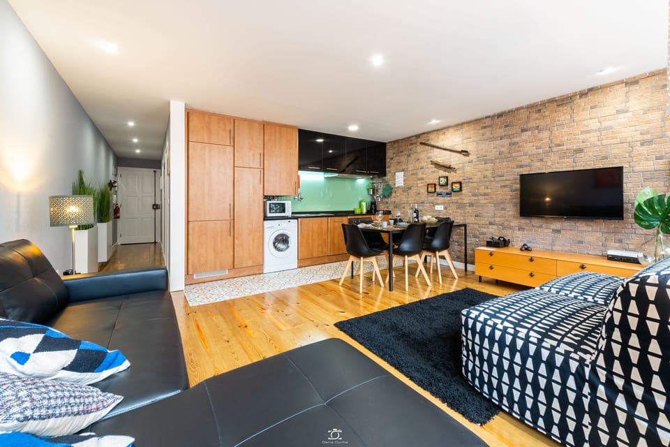 Family Apartment, 1 Bedroom, Non Smoking, City View | Living area | Flat-screen TV