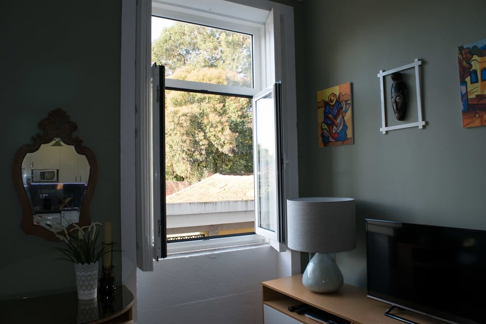 Family Apartment, 1 Bedroom, City View | Living area | 42-inch flat-screen TV with cable channels, Smart TV