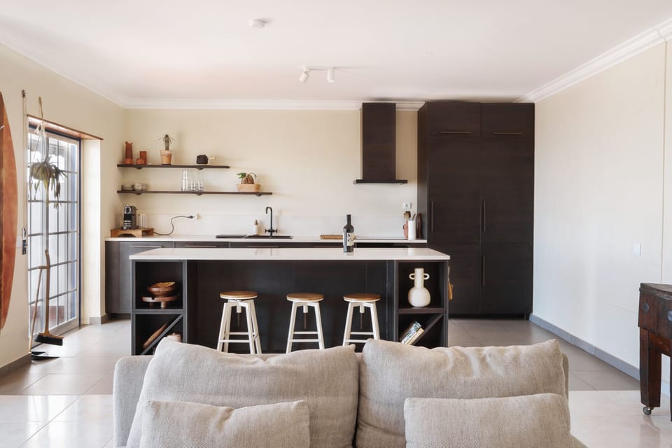 Spacious living room with modern kitchen