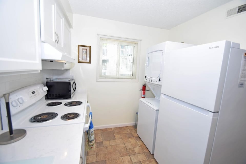 Condo, 2 Bedrooms | Private kitchen | Fridge, microwave, dishwasher, coffee/tea maker