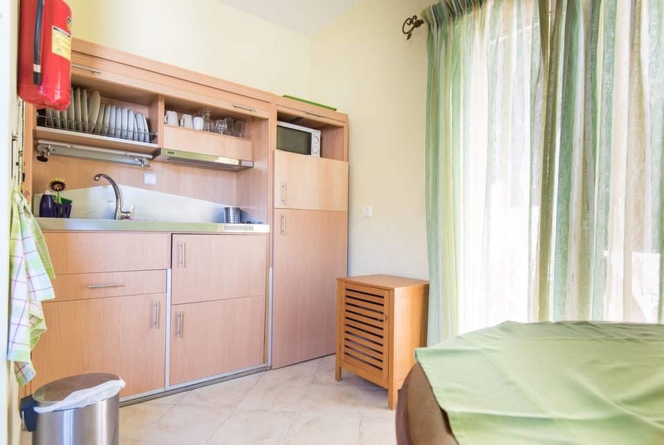 Premium Apartment (Portha) | Private kitchen | Espresso maker, coffee/tea maker, electric kettle, highchair