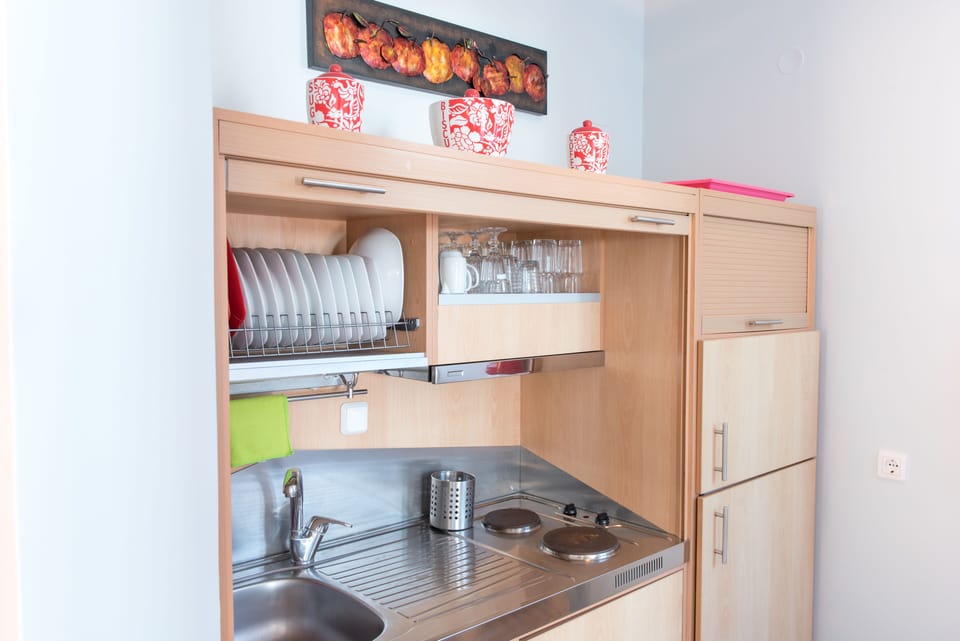 Premium Apartment (Nera) | Private kitchen | Espresso maker, coffee/tea maker, electric kettle, highchair