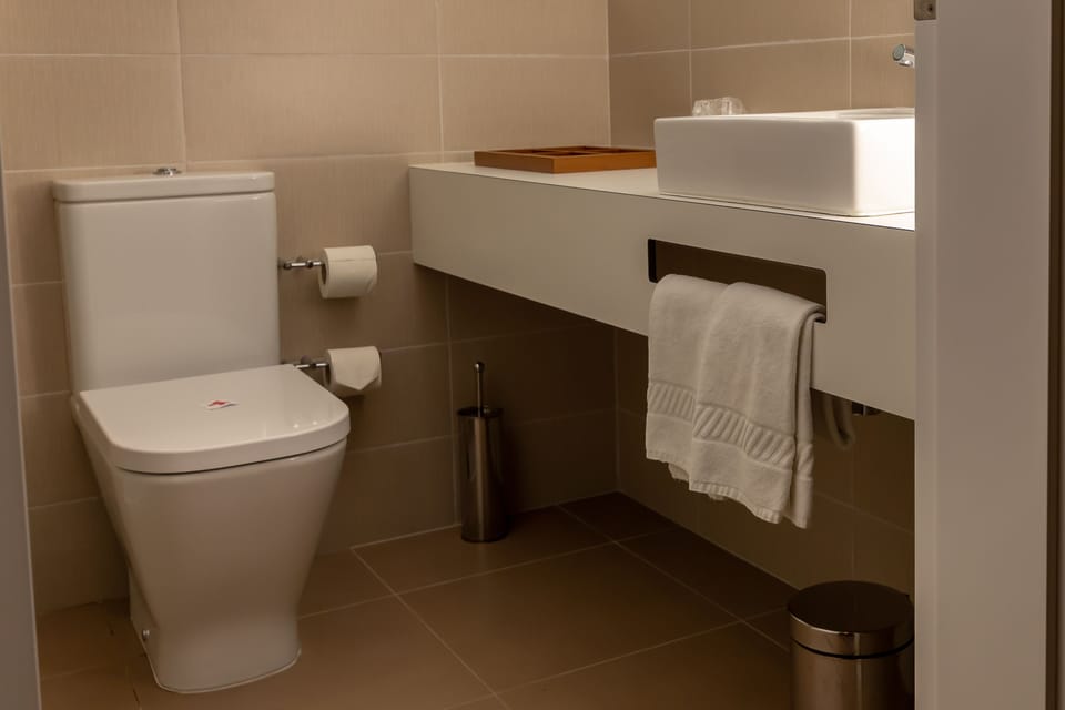 Family Studio | Bathroom | Shower, rainfall showerhead, hair dryer