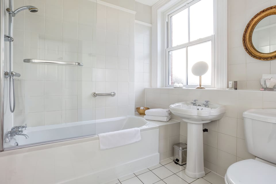 Shower, free toiletries, hair dryer, towels