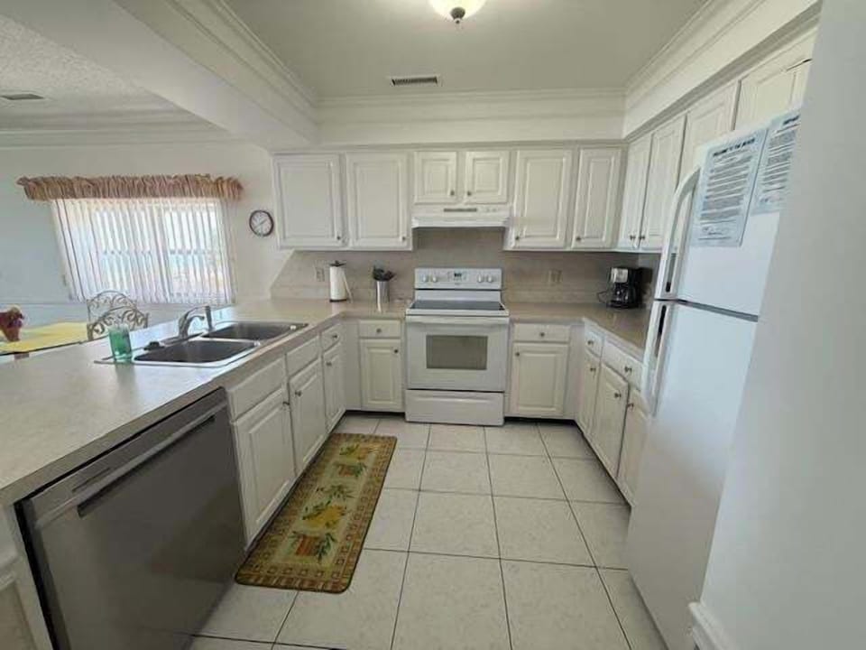 Condo, 2 Bedrooms | Private kitchen | Coffee/tea maker, fridge, oven, dishwasher