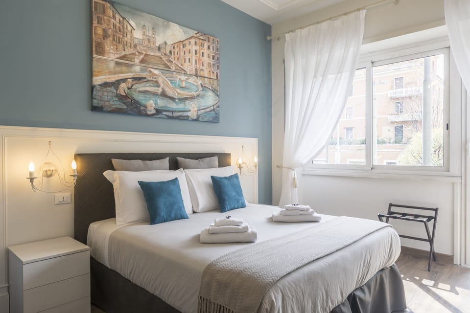 Camera Tripla con Balcone | Premium bedding, minibar, in-room safe, individually decorated