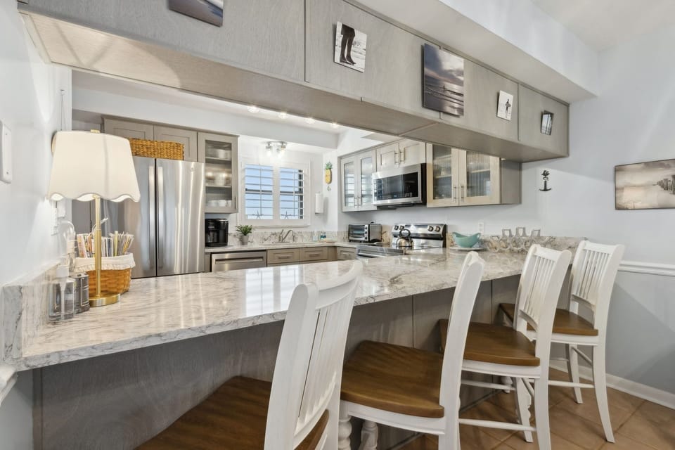 Condo, 2 Bedrooms | Private kitchen | Fridge, oven, coffee/tea maker
