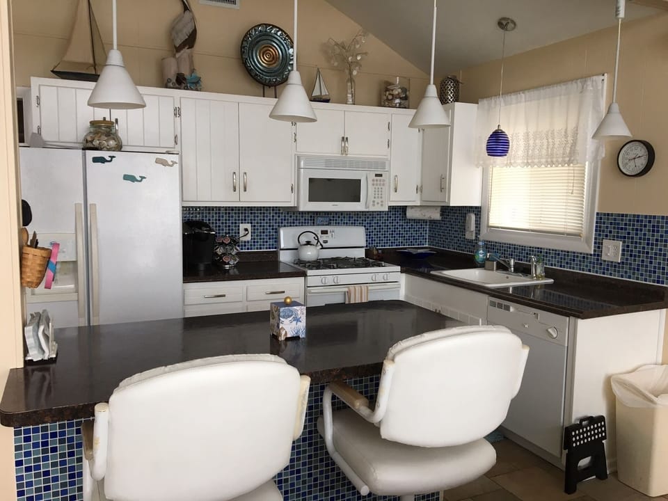 Gas stove and oven. Ice maker, dish washer