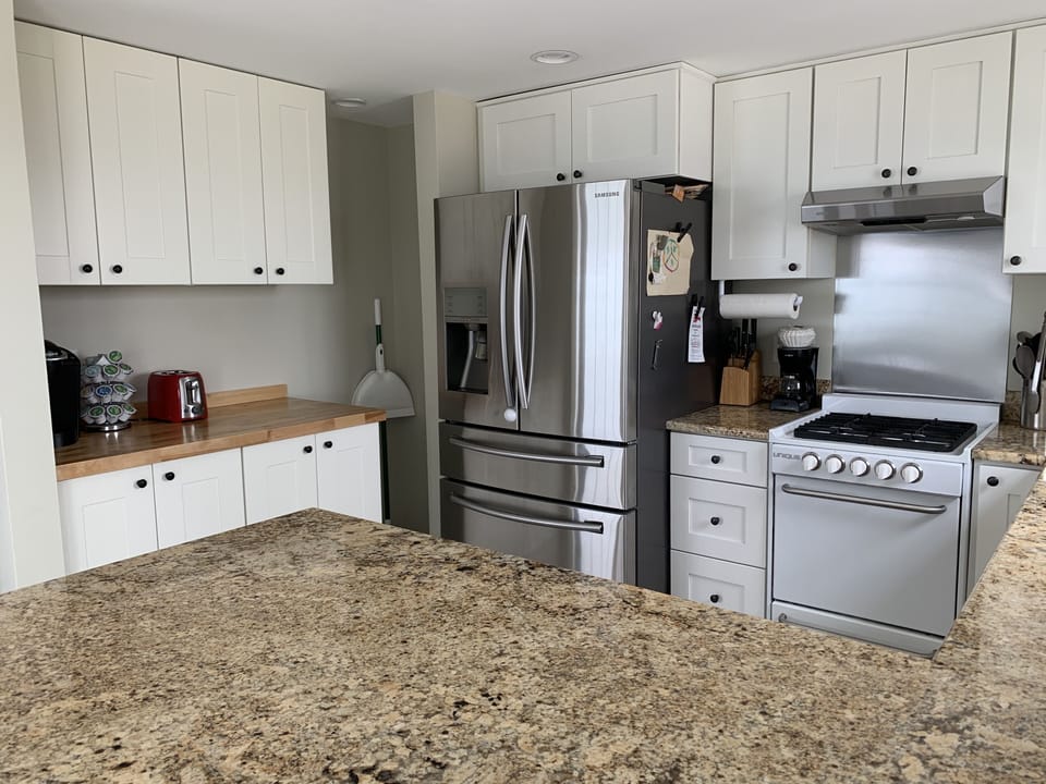 Full kitchen with all the appliances, utensils, plates, and silverware provided