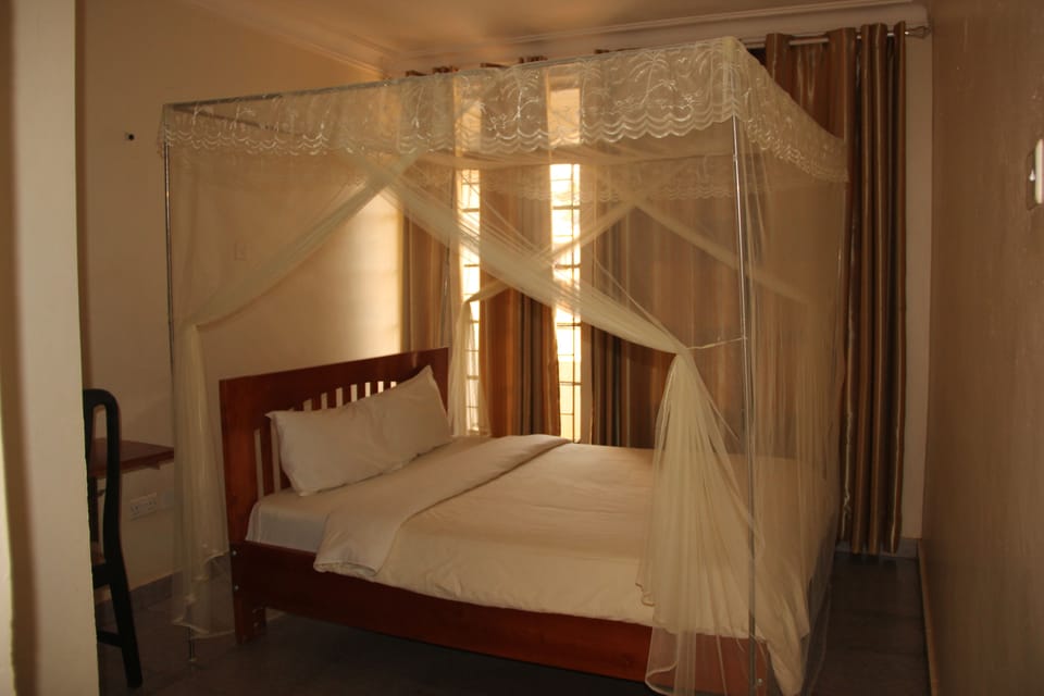 Standard Room | Desk, iron/ironing board, rollaway beds, bed sheets